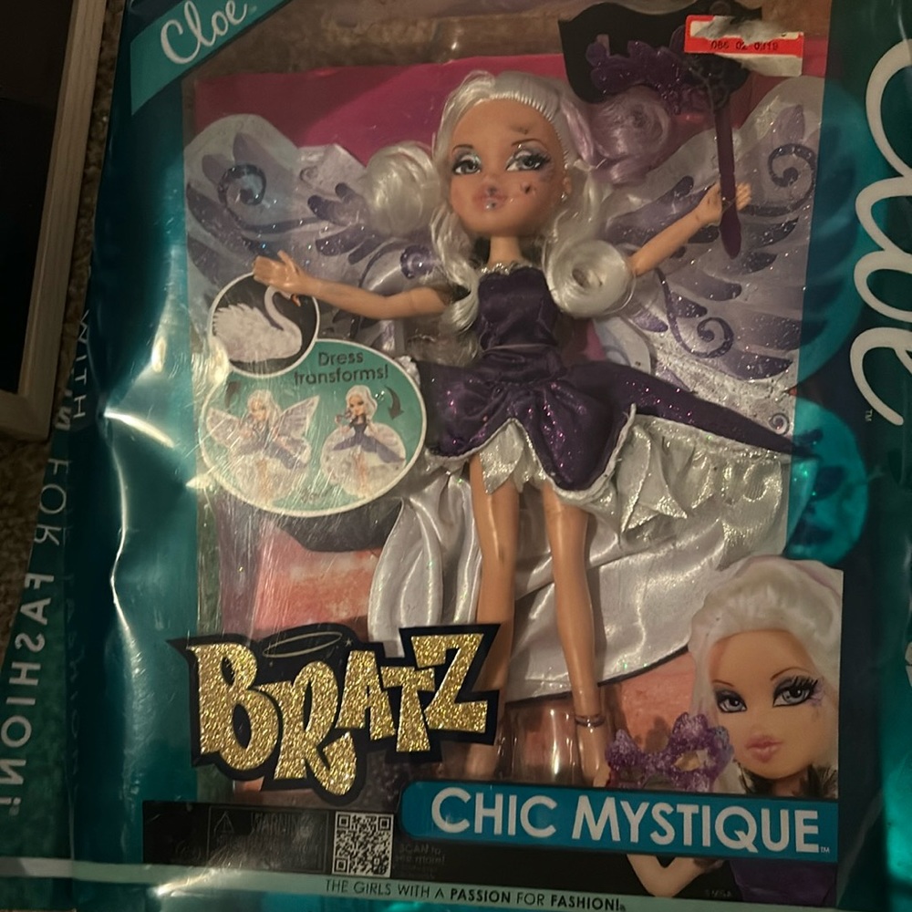 Bratz Chic Mystic Cloe doll new in box. Package is ruined doll needs cleaned.